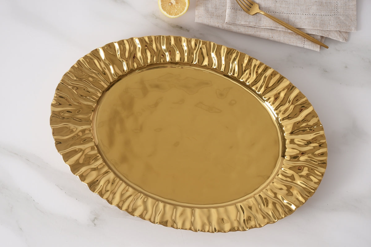 Shopping for Pampa Bay Ashley pieces? Discover the Mascali D’Oro 19-inch gold-tone platter. Oven safe to 500°F, dishwasher safe. Nationwide delivery