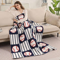 Baseball patterned reversible throw blanket, a cozy gift for baseball fans, birthdays, get well, thank you, Father’s Day, Mother’s Day, staff appreciation day, Christmas and holidays. NYC / New York City corporate gifts and gifts for all occasions, with nationwide delivery from our Long Island gift store
