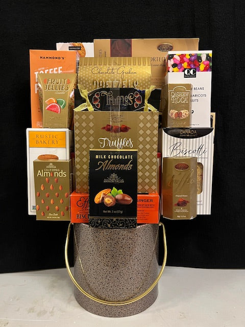 Luxury bronze ice bucket gift basket filled with premium gourmet treats - elegant corporate gift for New York clients, property managers, and tenant renewals