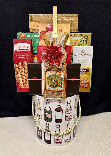 Luxury champagne bottle ice bucket gift basket filled with premium gourmet treats - festive corporate gift for NYC clients, tenant renewals, and holiday gifting