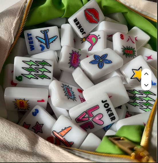 Pop Art Acrylic Mahjong Tile Set displayed in green zip travel bag - colorful joker and suit tiles with bold pop art artwork - unique birthday corporate gift - Oh My Mahjong, My Fair Mahjong alternative - New York City

