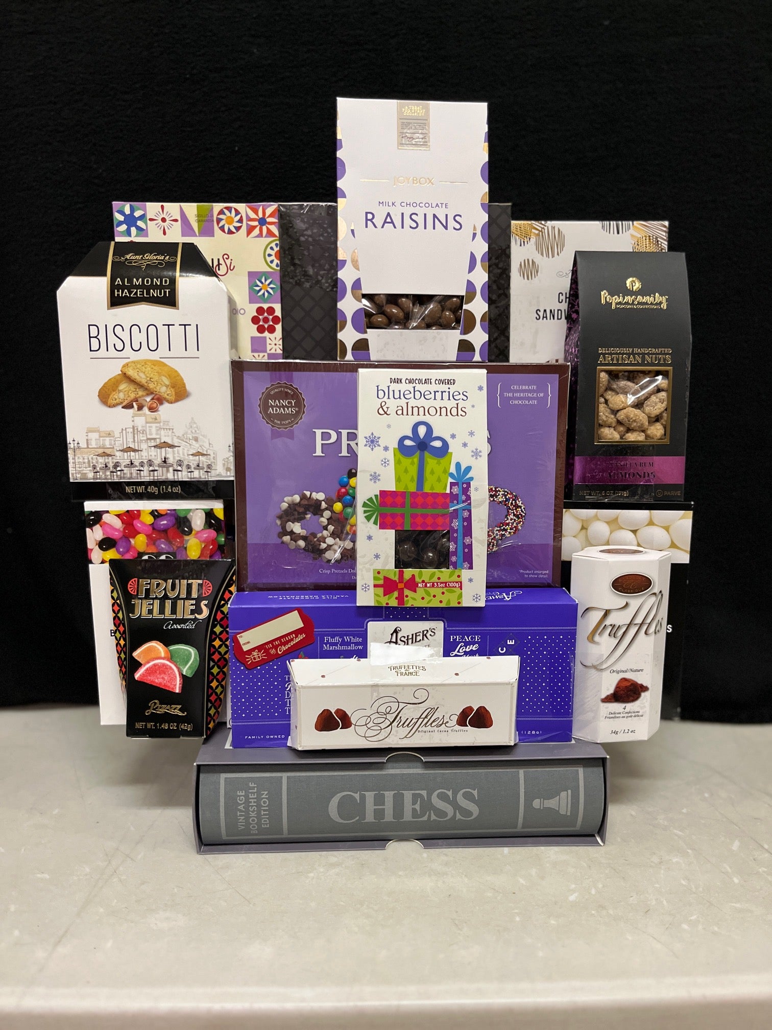 Luxury Chess bookshelf game with premium gourmet treats and snacks - elegant corporate gift basket for New York clients and tenant renewals