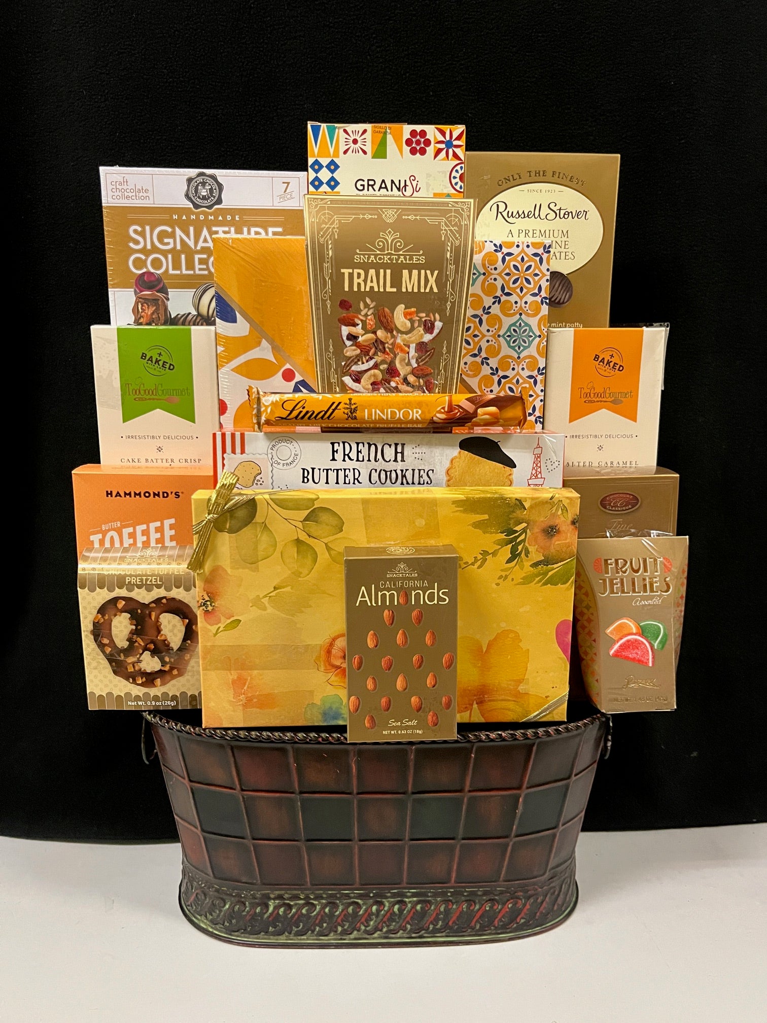 Corporate Gift Basket Condolence Tin - comforting gourmet packaged foods in warm yellows and golds presented in a rich brown bin - thoughtful corporate condolence gift with NYC delivery and nationwide shipping