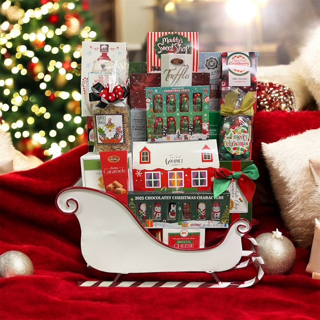 White holiday gourmet gift sleigh - festive decorative sleigh with premium sweet and savory treats, delivered nationwide and to New York City NYC - ideal for lease renewals, thank you gifts, sympathy baskets, housewarmings, and corporate holiday gifting