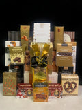 Golden Glow Gourmet Gift Basket Luxury Gathering - premium chocolates, cookies, nuts, and truffles in a warm gold packaging - NYC delivery and nationwide shipping