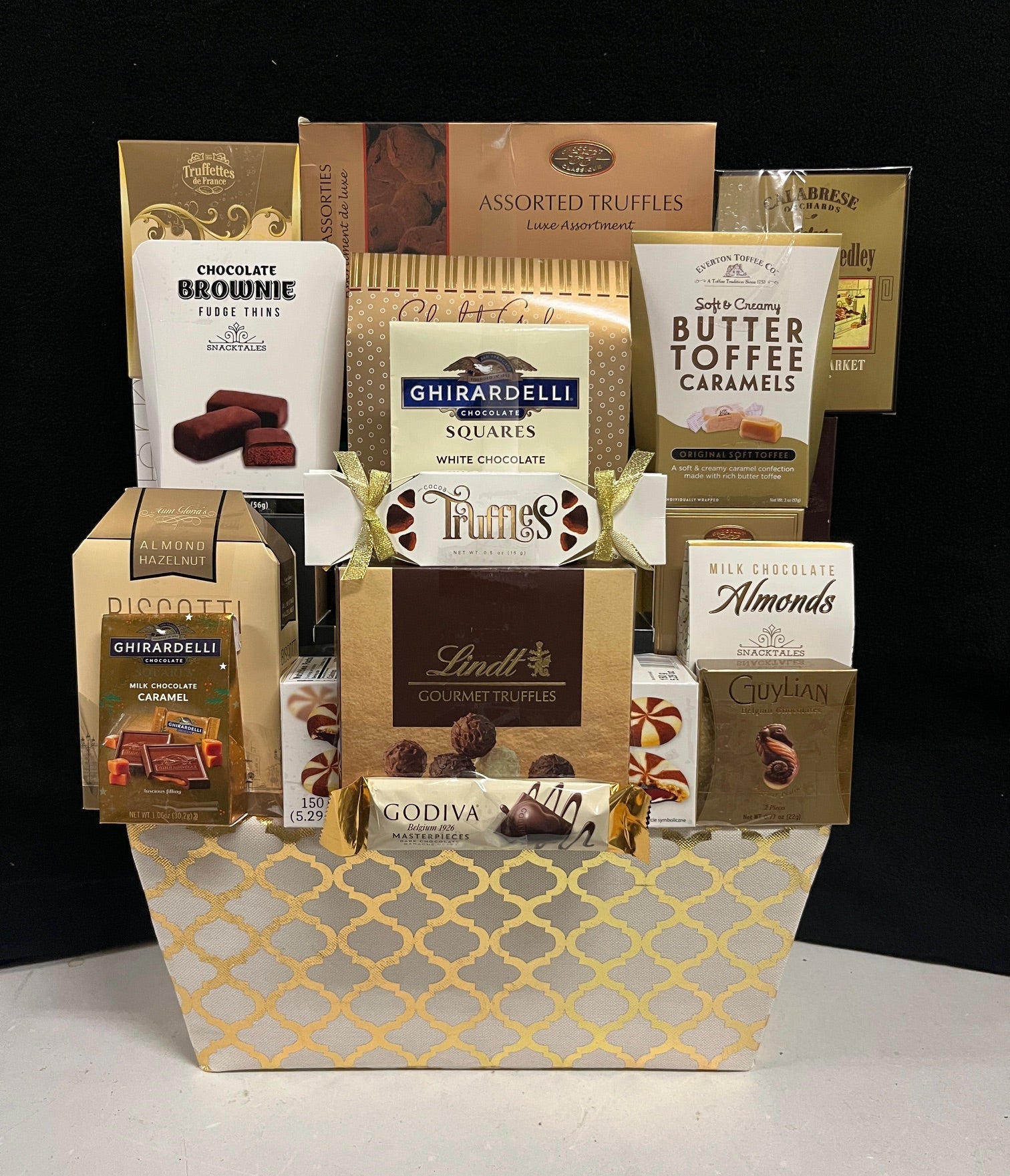 Gold fabric bin gourmet corporate gift - warm textured gold keepsake bin filled with luxury chocolates, gourmet candies, and premium sweets, delivered nationwide and to New York City NYC - perfect for corporate holiday gifts, client appreciation, and lease renewals