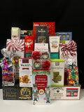 Holiday Hue Gourmet Gift Basket Luxury Gathering - premium holiday chocolates, cookies, nuts, and truffles in vibrant red and multicolor festive packaging - NYC delivery and nationwide shipping