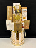 Luxury gold ice bucket gift basket filled with premium gourmet chocolates and treats - upscale corporate gift for NYC clients, colleagues, and office celebrations