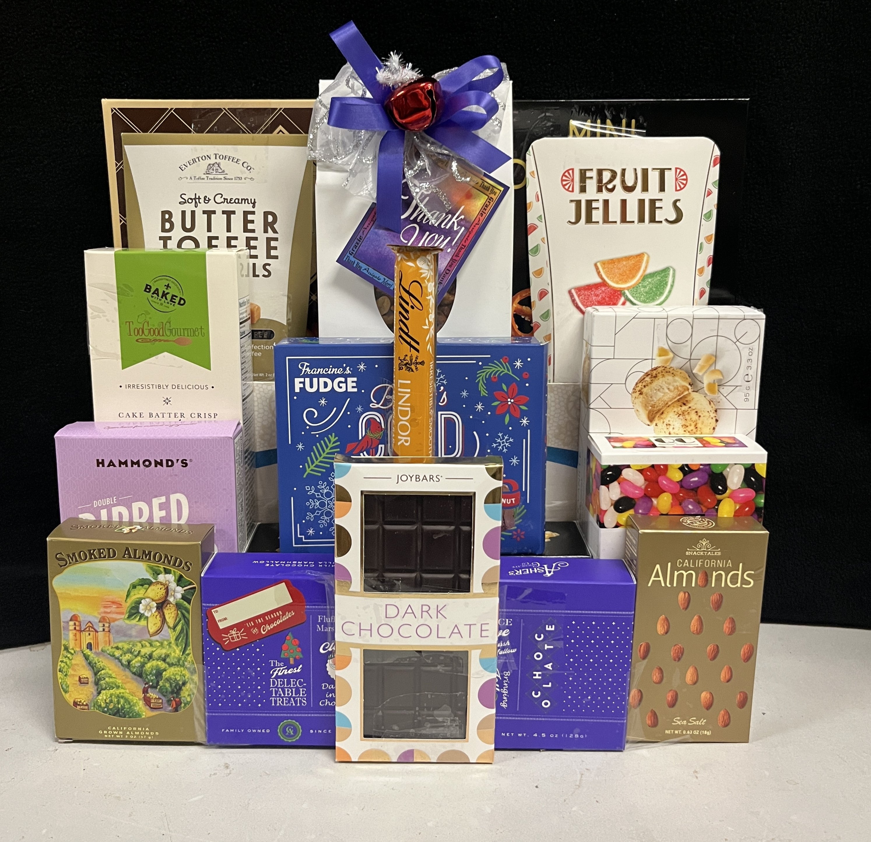 Popular Purple Luxury Gourmet Gift Basket Gathering - premium chocolates, cookies, nuts, and truffles in rich purple packaging - NYC delivery and nationwide shipping