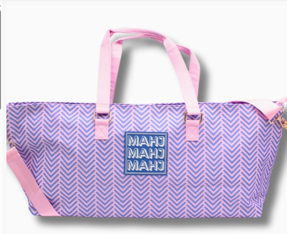 Purple and pink patterned bag with 'MAHJ' logo on a white background