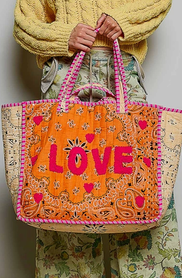 LOVE bandana quilted tote bag held by model - boho tote bag gift for colleagues, clients, Mother's Day and staff appreciation - NYC Long Island gift store, nationwide delivery