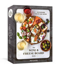 The Wine & Cheese Board Deck by Meg Quinn, boxed pairing cards with packaging featuring wine glasses, cheeses, appetizers, and olives