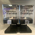 Customized branded candy canisters with a corporate logo, made for client appreciation and holiday gifting in NYC with nationwide delivery