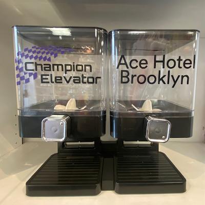 Customized branded candy canisters with a corporate logo, made for client appreciation and holiday gifting in NYC with nationwide delivery