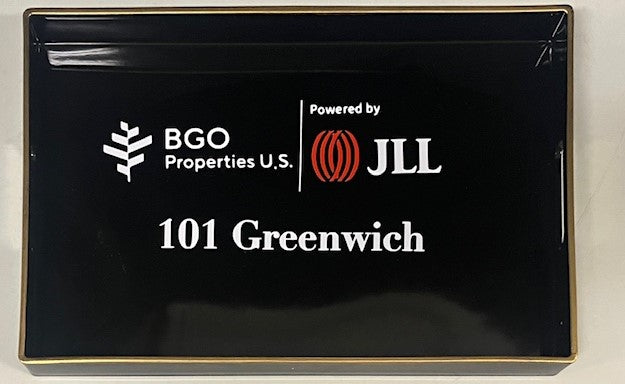Customized black gift tray with gold trim and corporate logos, a branded gift for client appreciation and holiday gifting in NYC with nationwide delivery