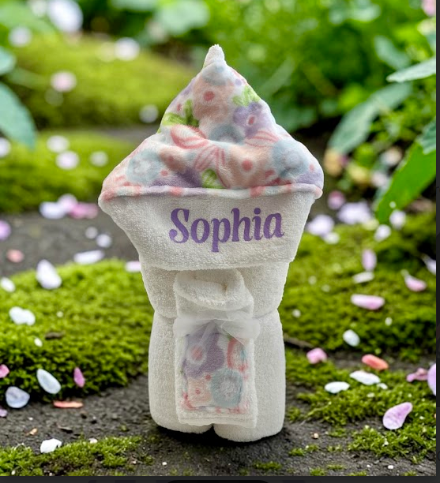 Personalized pastel floral hooded towel for baby - a unique baby shower or corporate gift delivered throughout NYC and the US