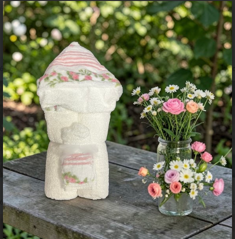 Pastel floral hooded baby towel - a beautiful bathtime gift for newborns and toddlers, shipped nationwide from New York