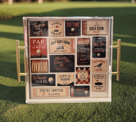 Acrylic tray with gold handles featuring a vintage golf slogan collage - phrases like Tee Time, Golf Club, Par, Fairway Finds, and Always Down For 18 - golf gift tray from The Pampered Professional, Long Island NYC, nationwide delivery
