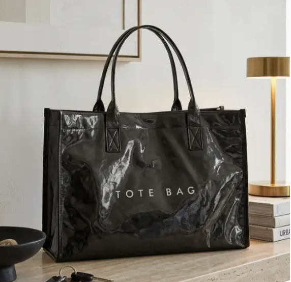 Oversized glossy black vinyl tote - spacious PVC handbag for work, travel, and everyday use - women's gift from Long Island gift store, nationwide delivery