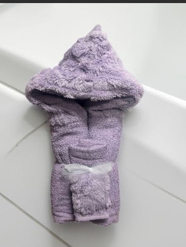 Lavender faux fur hooded towel for babies - poolside or bathtime luxury, delivered throughout NYC and beyond