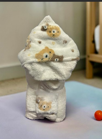 Neutral teddy bear hooded baby towel - a gender-neutral newborn or toddler bath gift, delivered nationwide from New York