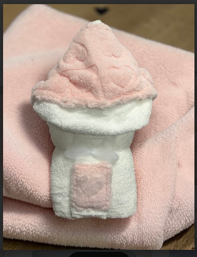 Pale pink hooded baby towel with hearts - a sweet newborn gift idea, available for personal and corporate gifting with New York delivery