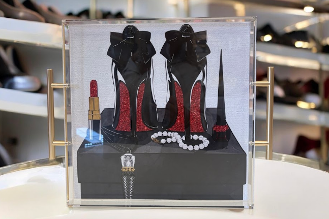 Red Bottom Shoes Acrylic Tray with gold handles featuring a luxury fashion illustration of black bow stilettos with red glitter soles, pearl necklace, gold lipstick, and crown charm - glamorous gift for her, NYC and Long Island boutique, nationwide delivery