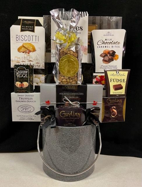 Textured graphite-silver ice bucket topped with biscotti, chocolates, nuts and fudge for holiday corporate gifting in NYC, Long Island and nationwide