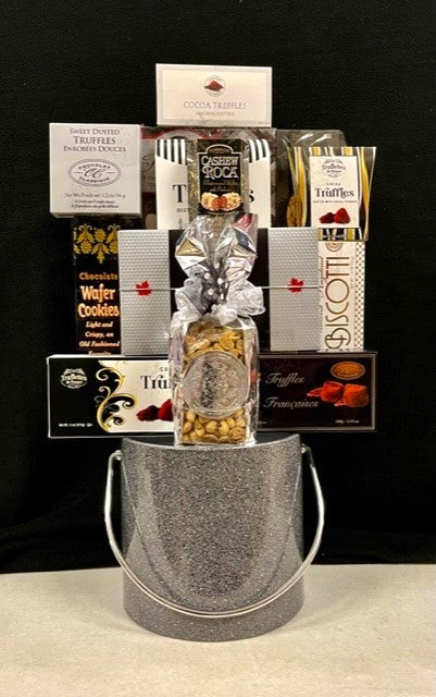silver ice bucket filled with gourmet chocolates, truffles and cookies for holiday corporate gifting, tenant gifts and client gifts in NYC, Long Island and nationwide