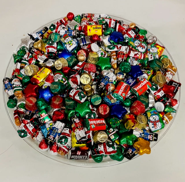  holiday platter filled with individually foil-wrapped chocolates in festive red, green, gold, silver, and blue wrappers. NYC / New York City corporate gifts and gifts for all occasions
